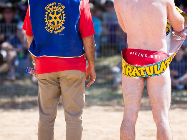 A competitor waits for the infamous budgie smuggler race at the Henley on Todd Regatta in Alice Springs August 19 2017. Photo: EMMA MURRAY