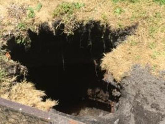 CFA have sent through these pics of the sinkhole. I had requested some pics of them actually rescuing the woman and this is all they have. Not sure what our photographer got out there, but if these are of any use, can you please add them to the system. In Springvale South