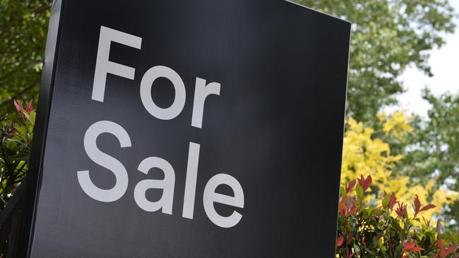 A real estate For Sale sign on a property in East Toowoomba, house for sale, Thursday, December 21, 2017.