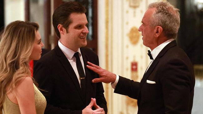 Robert F. Kennedy Jr. (R) talks with Matt Gaetz and his wife Ginger Luckey Gaetz at Mar-a-Lago. Picture: Getty Images via AFP.