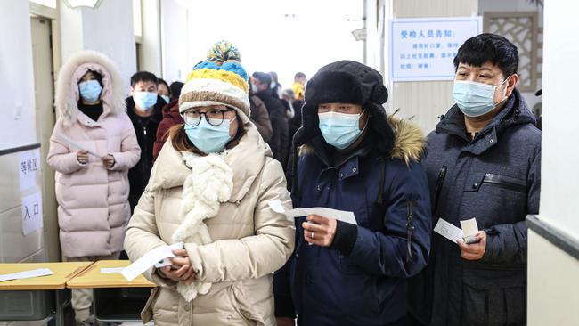 Residents line up to be tested for COVID-19 in Shenyang, in China's northeast Liaoning province, on Thursday. Picture: AFP