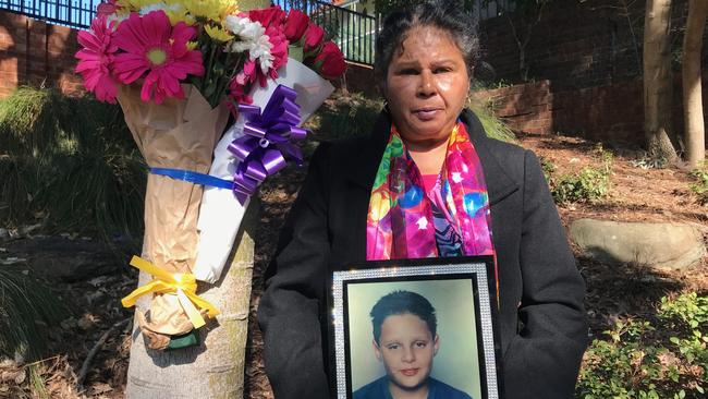 Julieanna Szabo joined Redfern Superintendent Andrew Holland on the 20-year anniversary of a suspicious house fire that killed her then 13-year-old son Arthur Haines. Picture: Laura Sullivan