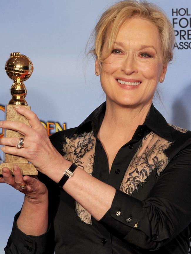 Meryl Streep poses with her Golden Globe for Best Performance by an Actress in a Motion Picture — Drama award for The Iron Lady. Picture: AFP