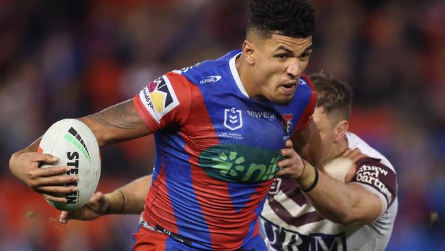 NEWCASTLE, AUSTRALIA - JUNE 05: Kai Pearce-Paul of the Knights breaks a tackle during the round 14 NRL match between Newcastle Knights and Manly Sea Eagles at McDonald Jones Stadium, on June 05, 2025, in Newcastle, Australia. (Photo by Scott Gardiner/Getty Images)