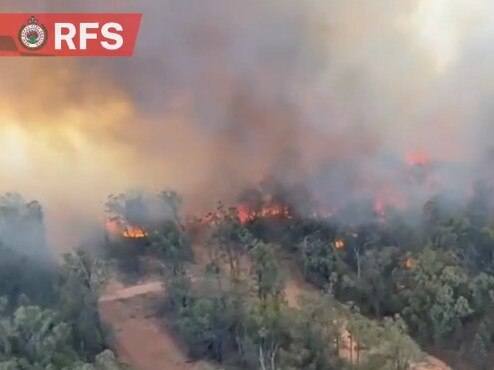 An overnight thunderstorm has threatened to worsen conditions for firefighters. Picture: RFS