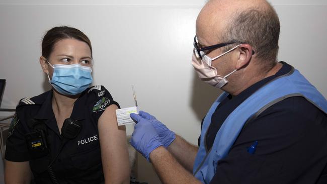 South Australia Police Officer, Amanda Kuchel receives her first injection of COVID-19 vaccine at The Royal Adelaide Hospita. Picture: NCA NewsWire / Emma Brasier