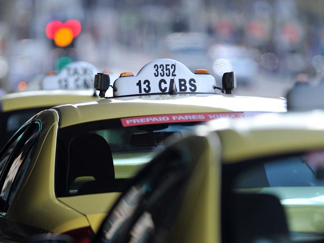 Generic and stock images around Melbourne CBD. Taxi rank outside Flinders Station - 13 Cabs