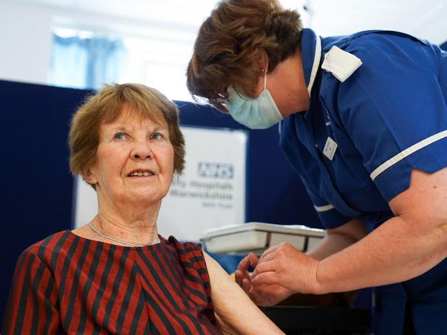 Margaret Keenan, 91, who was the first patient in the UK to receive the Pfizer-BioNtech Covid-19 vaccine, receives her booster shot at University Hospital Coventry. Picture: AFP