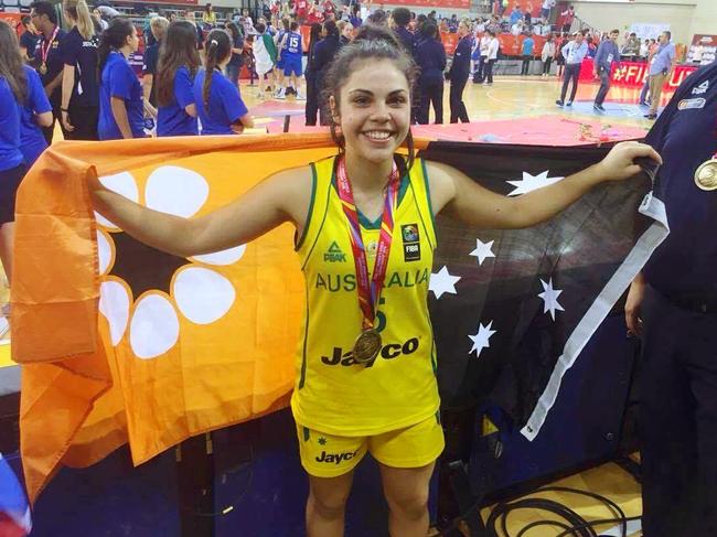 Proud Territorian Abby Cubillo pictured celebrating Australia’s tournament victory at the FIBA 2016 Under-17 World Championships in Spain.