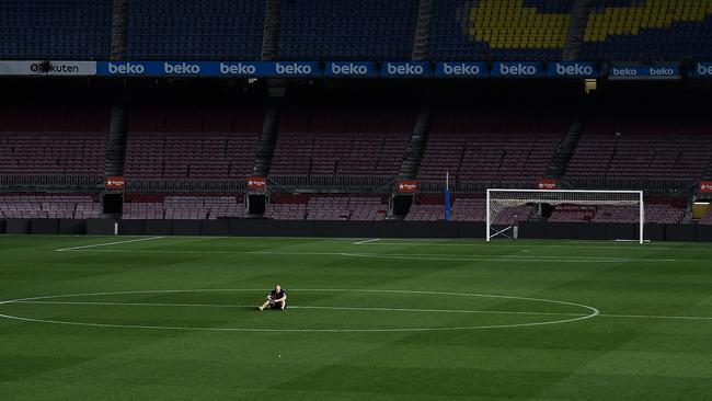 BARCELONA, SPAIN - MAY 20: Andres Iniesta of FC Barcelona sits on the pitch at the end of La Liga match between Barcelona and Real Sociedad at Camp Nou on May 20, 2018 in Barcelona, Spain. The FC Barcelona captain played his last match with the FC Barcelona. (Photo by David Ramos/Getty Images)