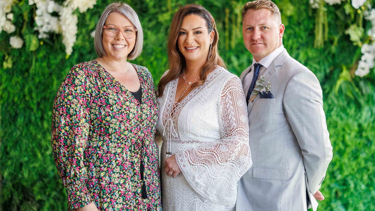 Leah Cook and Travis Bedford pose with their celebrant, Victoria Edwards. Picture: Joey’s Photography