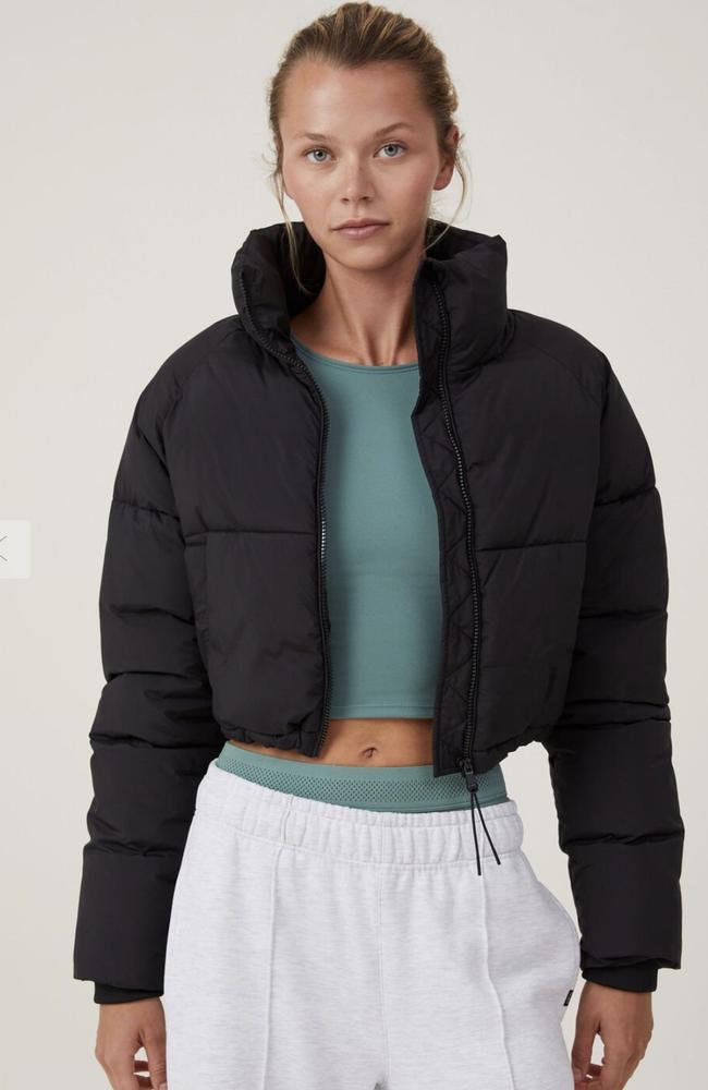 Cotton On The Mother Puffer Cropped Jacket – $35.99 is a dupe of two designer puffer jackets. Picture: Supplied