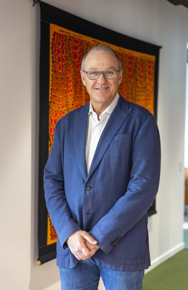 Ex-PwC Australia chief executive Tom Seymour standing in the new Darwin office. Picture: Floss Adams.