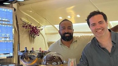 Culture editor for The Age and Sydney Morning Herald Osman Faruqi (left) and The Age's deputy news director Angus Livingston (right) at the Emirates lounge at the 2024 Australian Open. Picture: Instagram