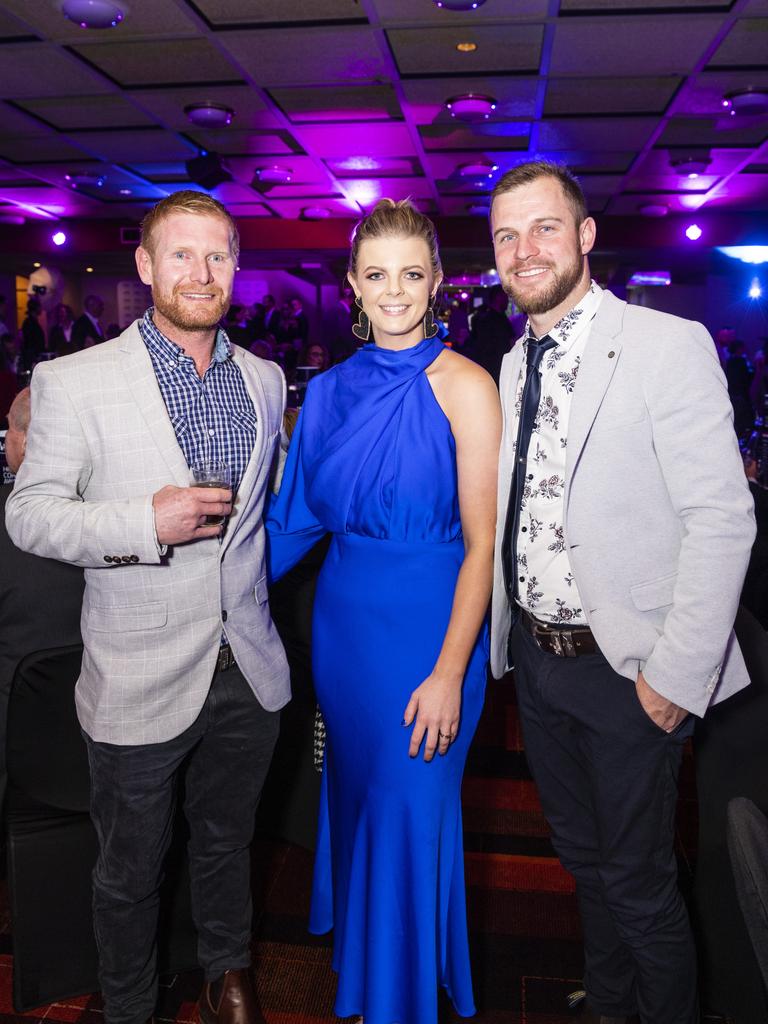 Tim Smith (left) of Tim Smith Constructions with Amy and Chris Evans of Lavish Constructions at the Downs and Western Housing and Construction Awards at Rumours International, Friday, July 22, 2022. Picture: Kevin Farmer