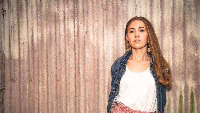 Bella Mackenzie was shocked to be pulled on stage with her idol to sing in front of crowd in Mackay.