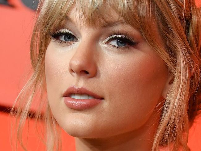 (FILES) In this file photo Singer/songwriter Taylor Swift arrives on the red carpet for the Time 100 Gala at the Lincoln Center in New York on April 23, 2019. - Unleash the Swifties: Taylor Swift has tapped her millions-strong social media fan base to pressure the heads of her former label, who she says are wielding "tyrannical control" over her music. (Photo by ANGELA  WEISS / AFP)