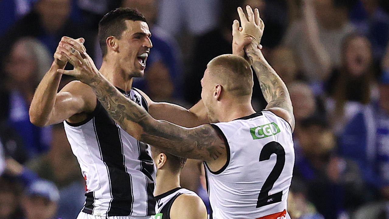 Scott Pendlebury and Jordan De Goey celebrate a Collingwood goal against North Melbourne at Marvel Stadium in May 2021. Picture: Michael Klein