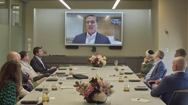 The List property round table lunch, with Paul Blackburne on the screen, at Wingate offices in Melbourne. Picture: Josh Robenstone