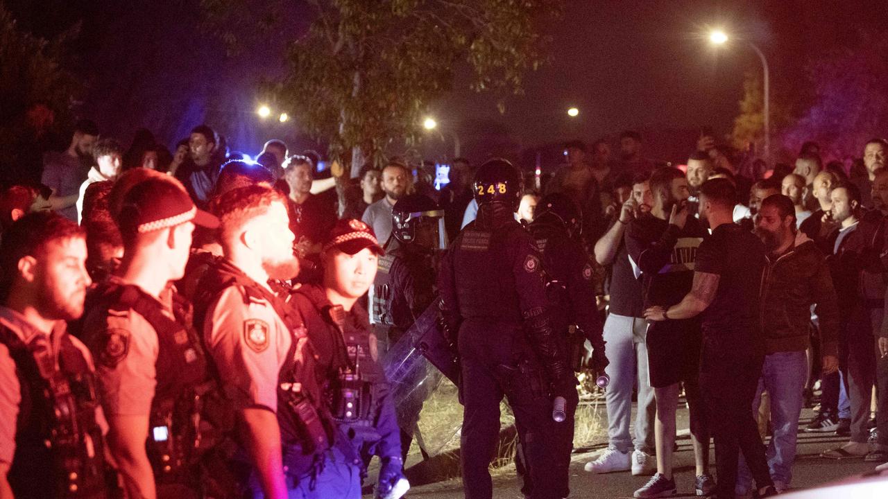 The wild scenes where a mob took part in a riot outside the Wakeley church. Picture: Liam Mendes