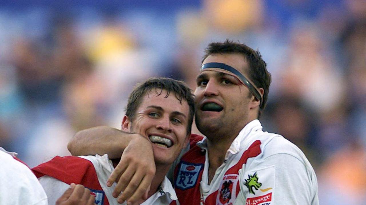 SEPTEMBER 30, 2001 : Matt Cooper (L) & captain Andrew Bobbin celebrate after St George-Illawarra Dragons defeated Parramatta in First Divison Grand Final at Stadium Australia, Homebush, 30/09/01. Pic Mark Evans. Rugby League