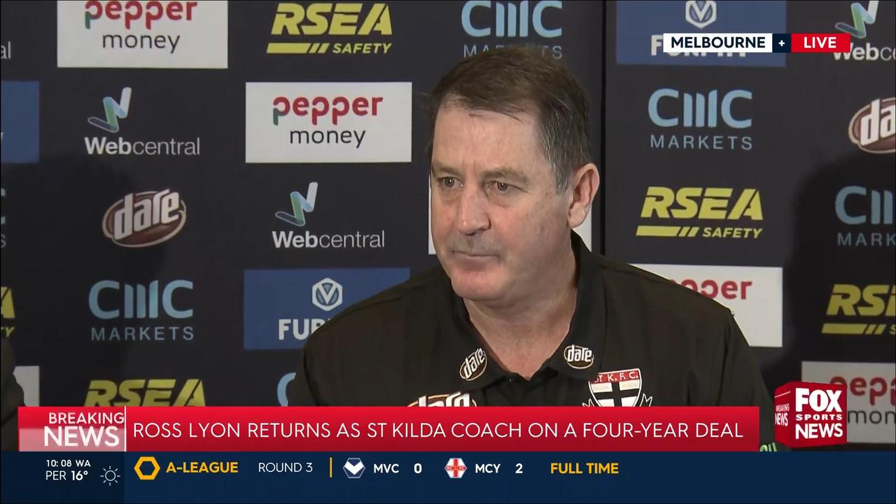 Ross Lyon faces the press.