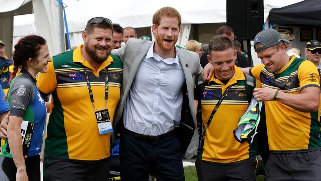 Prince Harry gets a photo with Australian Invictus Games competitors. Picture: Jonathan Ng