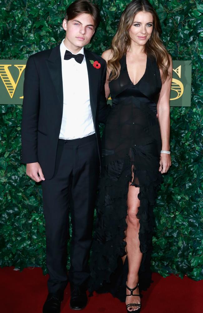 She credits her son, Damian Hurley, left, with her being her Instagram photographer. Picture: Getty Images