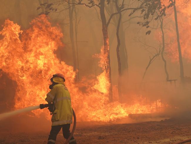 A supplied image obtained on Tuesday, February 2, 2021, shows Fire fighters, combat the Wooroloo Bushfire that has spread towards Ellenbrook. At least 56 homes have been destroyed by a bushfire in the Perth Hills, but authorities say there have been no reports of lives lost. Picture: The West Australian