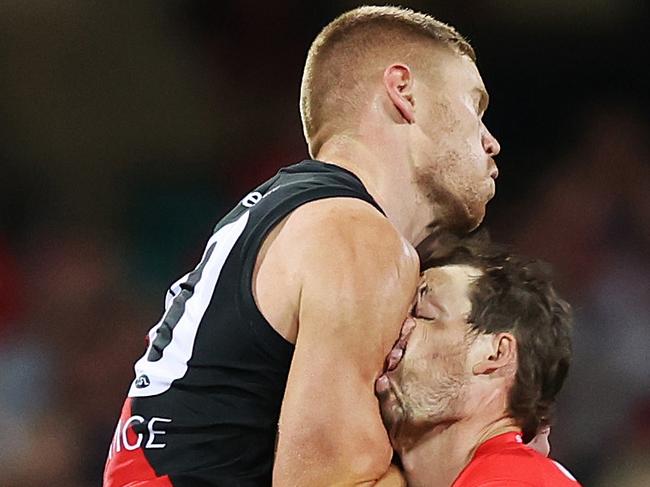 Peter Wright makes contact with Harry Cunningham’s head. Picture: Getty Images