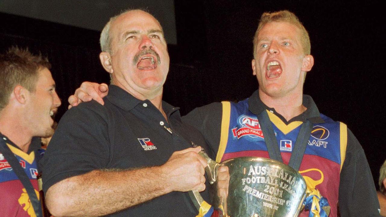 29/9/2001. Leigh Matthews and Michael Voss, with premiership cup, at the Brisbane Lions Grand Final celebrations at Rod Laver Arena.
