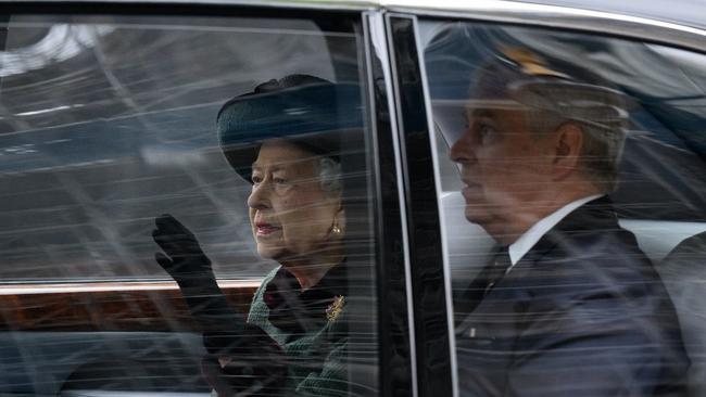 Britain's Queen Elizabeth II travels with her son Prince Andrew, Duke of York, as they leave the Thanksgiving Service for the Duke Of Edinburgh at Westminster Abbey, in London, England. Picture: Getty