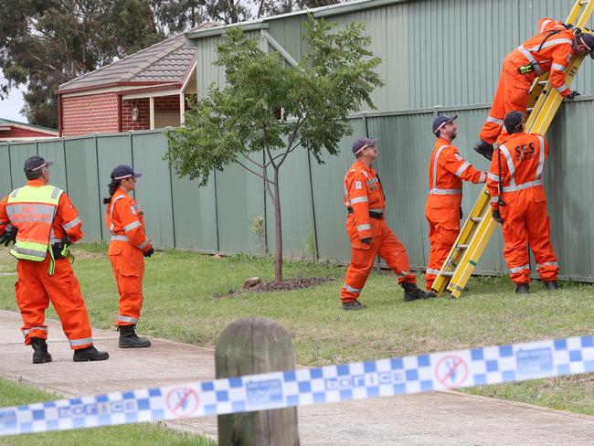 SES crews search the scene after the fatal brawl. Picture: NewsWire/ David Crosling