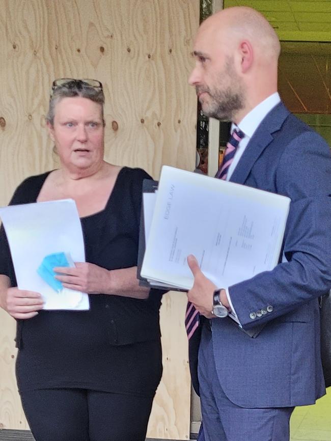 Amber McCabe outside the District Court with her lawyer Chris Pouras after an earlier hearing. Picture: Supplied