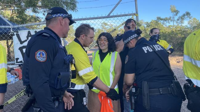 Binybara Camp protester Jessica Black and others were removed from the Lee Point development site as land clearing begins on Tuesday, April 30. Picture: Zizi Averill