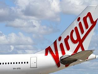The new Virgin Australia logo on the tail of one of the Airbus A330 aircraft during announcement of rebranding from Virgin Bl...