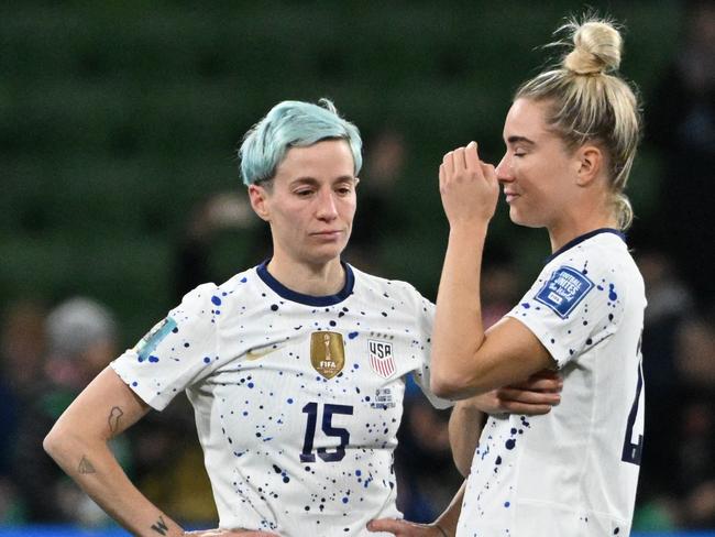 USA’s Megan Rapinoe (L) and Kristie Mewis (R) after their side’s penalty shootout loss to Sweden. Picture: WILLIAM WEST / AFP).