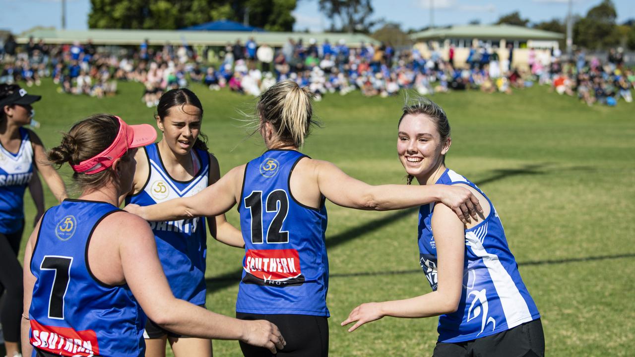 Saints celebrate their win in extra time against Highfields in the C-grade women’s grand final.