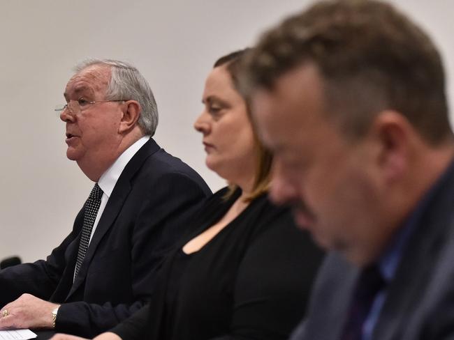 7-Eleven's outgoing chairman Russ Withers and chief executive Warren Wilmot are pictured with the company’s general manager of operations Natalie Dalbo at a Senate Committee hearing last Thursday.