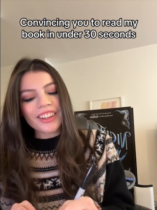 Alex Aester convincing her audience to read her book. Picture: TikTok