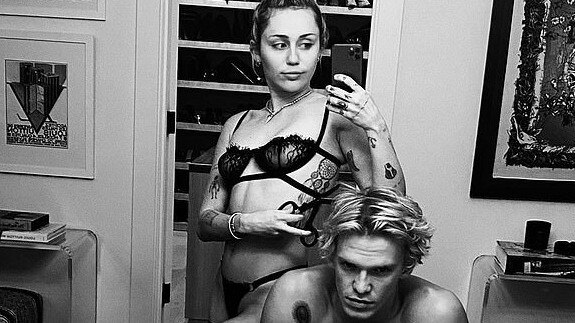 Miley Cyrus gives Cody Simpson a racy haircut in lingerie. Picture: Instagram