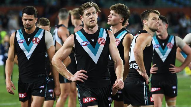 A dejected Tom Jonas leaves the Adelaide Oval after his side’s loss. Picture: Getty Images