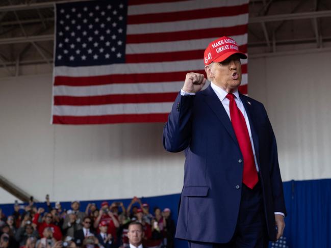 JUNEAU, WISCONSIN - OCTOBER 06: Republican presidential nominee former President Donald Trump arrives for a rally at Dodge County Airport on October 06, 2024 in Juneau, Wisconsin. The rally follows one yesterday where Trump addressed thousands of supporters near Butler, Pennsylvania, at the site where he was wounded by a gunshot on July 13.   Scott Olson/Getty Images/AFP (Photo by SCOTT OLSON / GETTY IMAGES NORTH AMERICA / Getty Images via AFP)