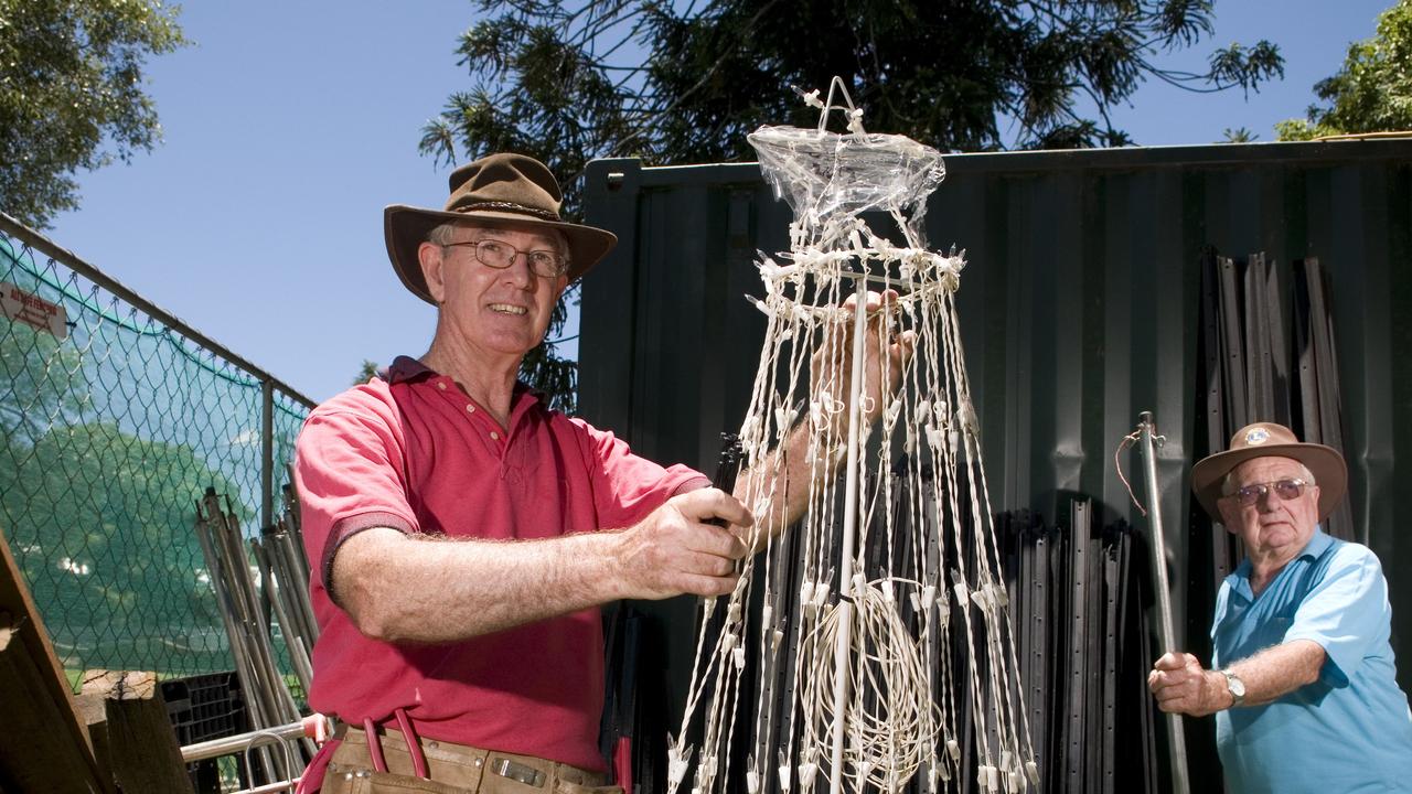 Lions Club of West Toowoomba members and volunteers including David Orton (left) and Harold Schiller get Queens Park ready for Toowoomba's Christmas Wonderland, Monday, November 25, 2013. Photo Kevin Farmer / The Chronicle