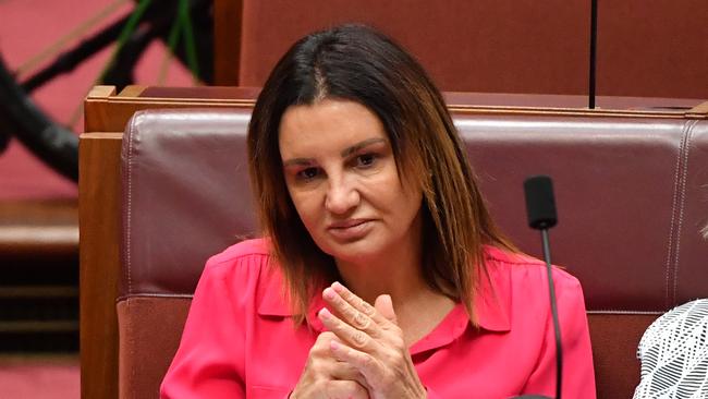 Senator Jacqui Lambie in the Senate chamber at Parliament House in Canberra. (AAP Image/Mick Tsikas)