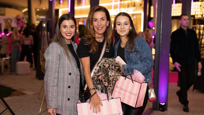 Lauren Goodellis, Jano Kotzas and Liberty Kotzas at the Victoria's Secret Queensland Flagship Store Opening at Pacific Fair. Photo: Celeste Humphrey