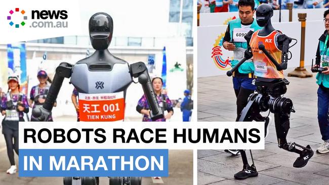 Humanoid robots race humans in a half-marathon in Beijing
