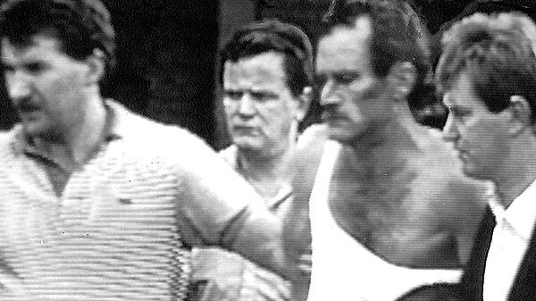 Russell Cox following his capture with fellow escapee Ray Denning at Melbourne’s Doncaster Shopping Centre in 1988.