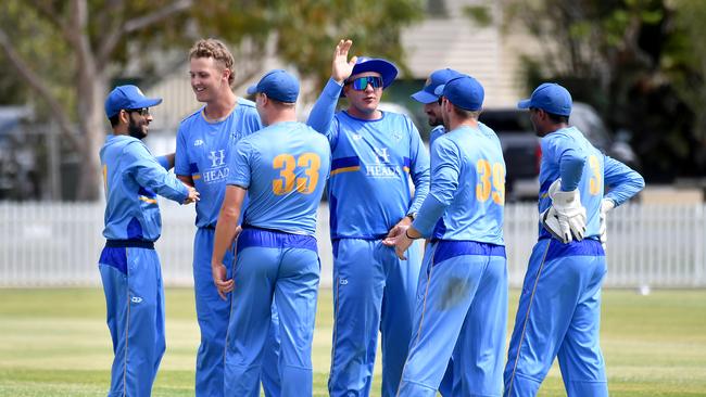 Norths players celebrate a wicket First grade cricket between Wynnum Manly and Norths. Saturday September 23, 2023. Picture, John Gass