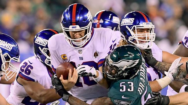 Eli Manning is sacked by Nigel Bradham #53 of the Philadelphia Eagles. Picture: Getty Images